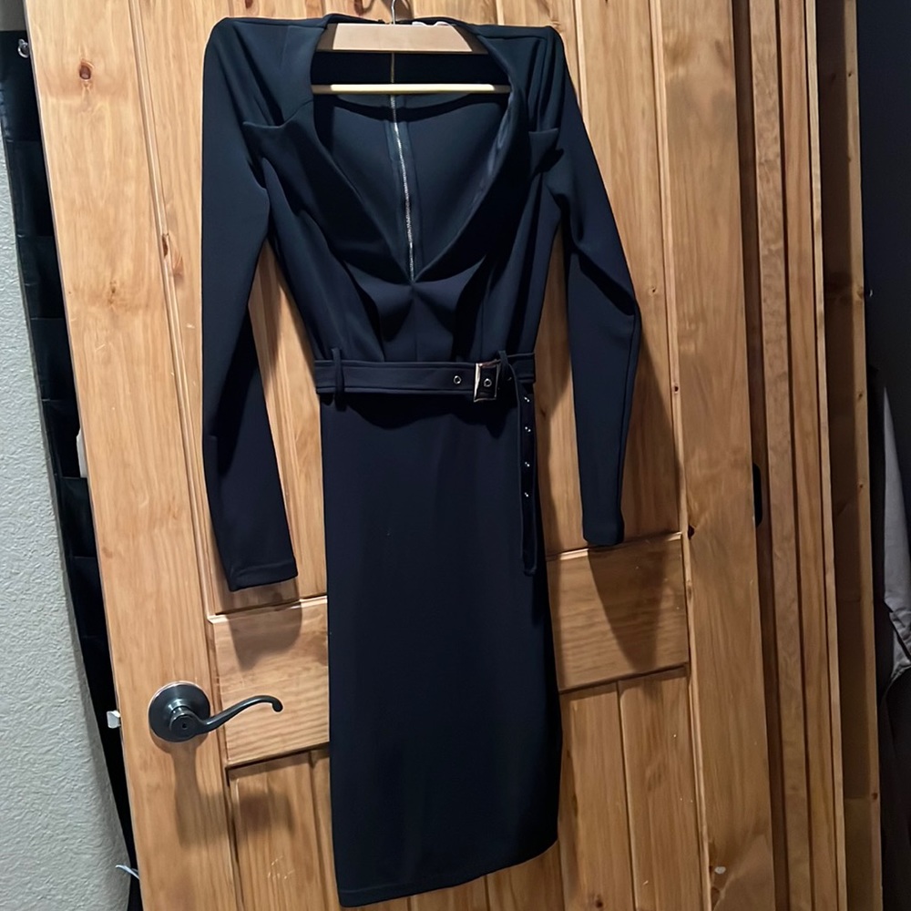 Sophisticated Black pencil dress slit in back